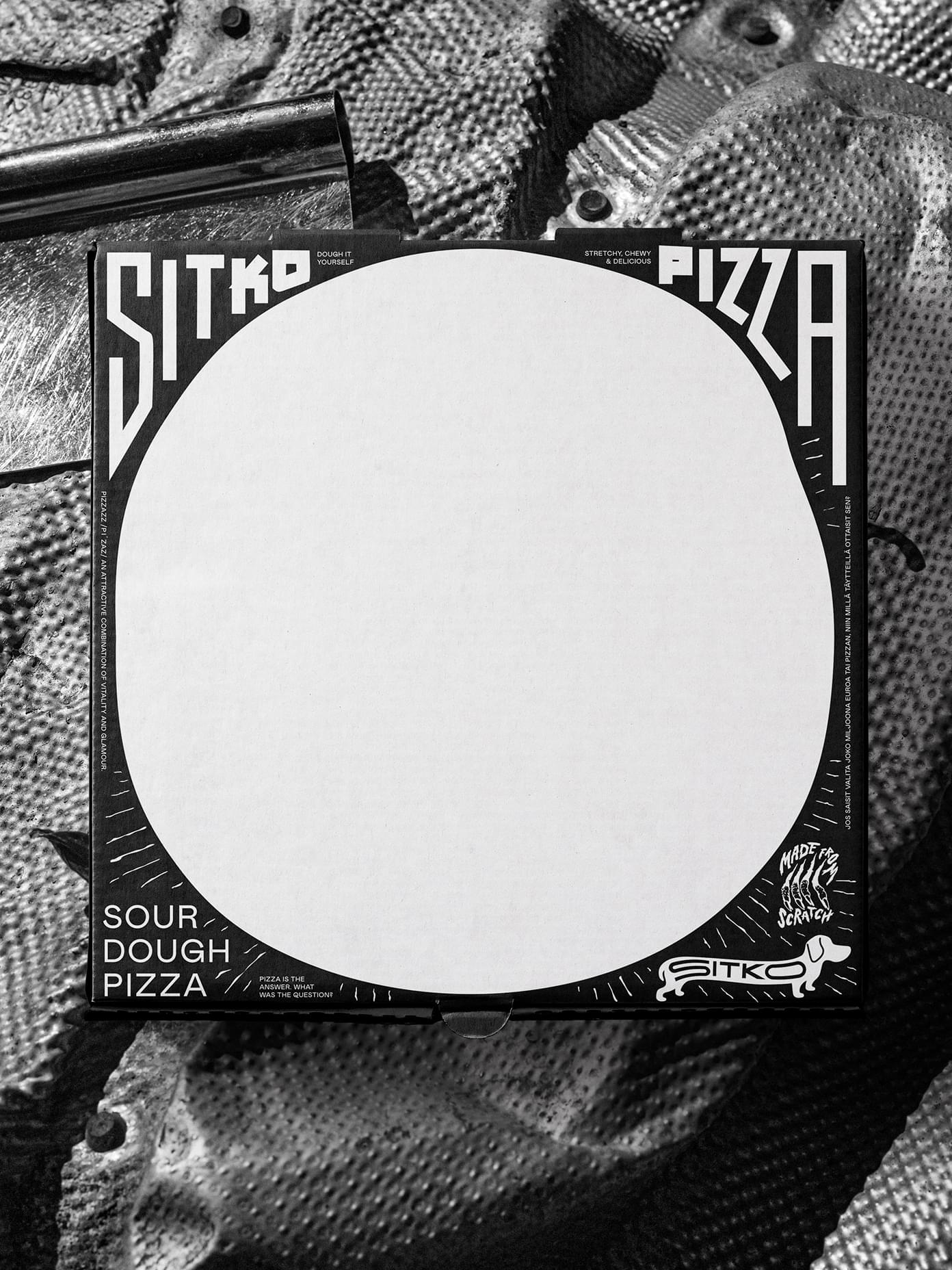 Sitko Pizza black-and-white sourdough pizza box with bold graphic typography and a dachshund logo.