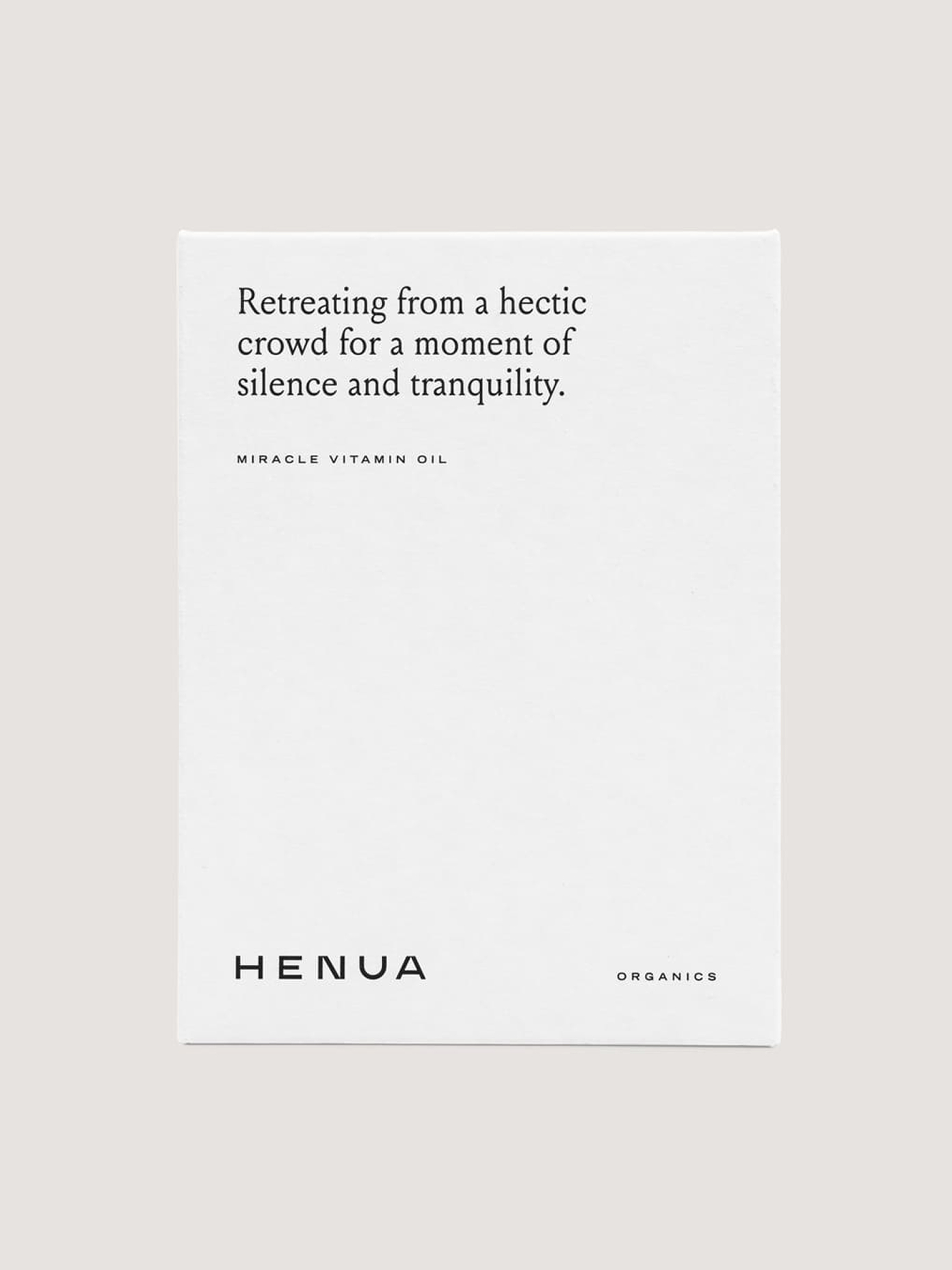Henua Organics Miracle Vitamin Oil white product box with minimalist black typography on light grey background.