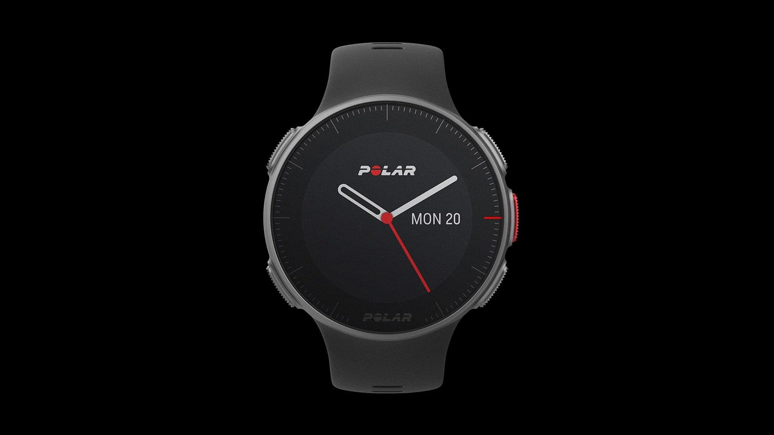 Polar smartwatch in black with analogue watch face.