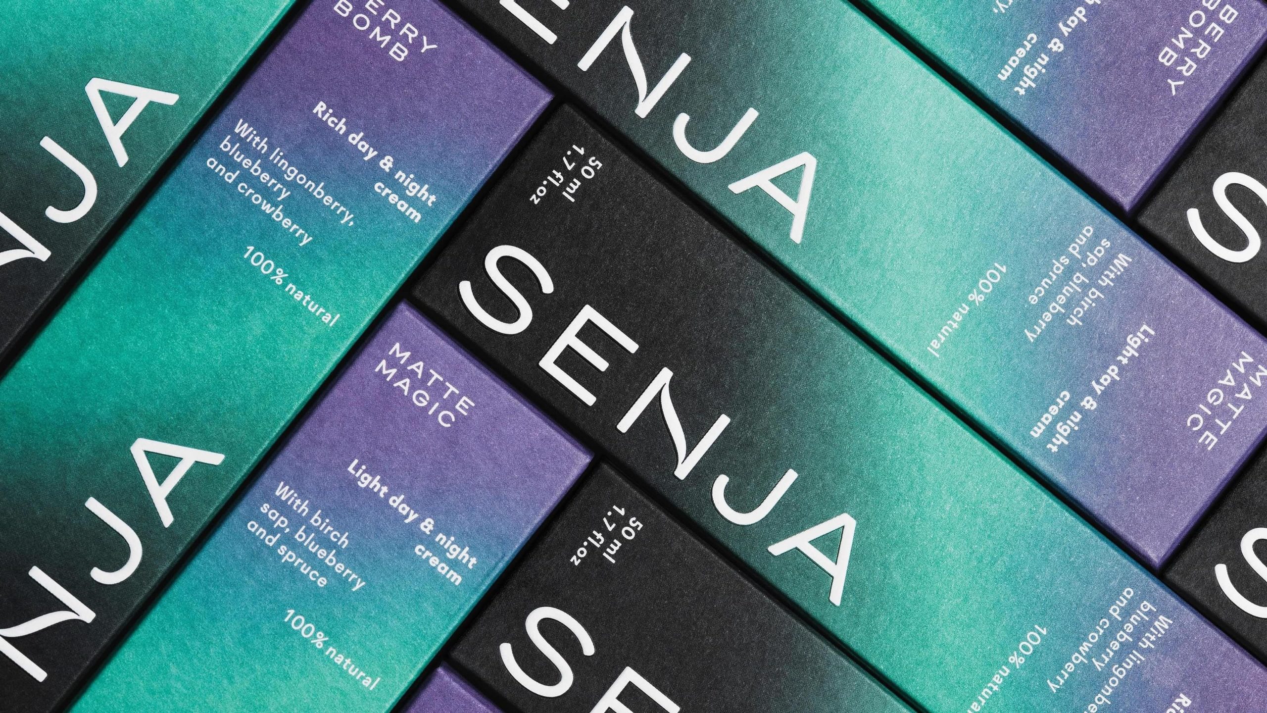 Senja Cosmetics packaging boxes with teal-to-purple gradients.