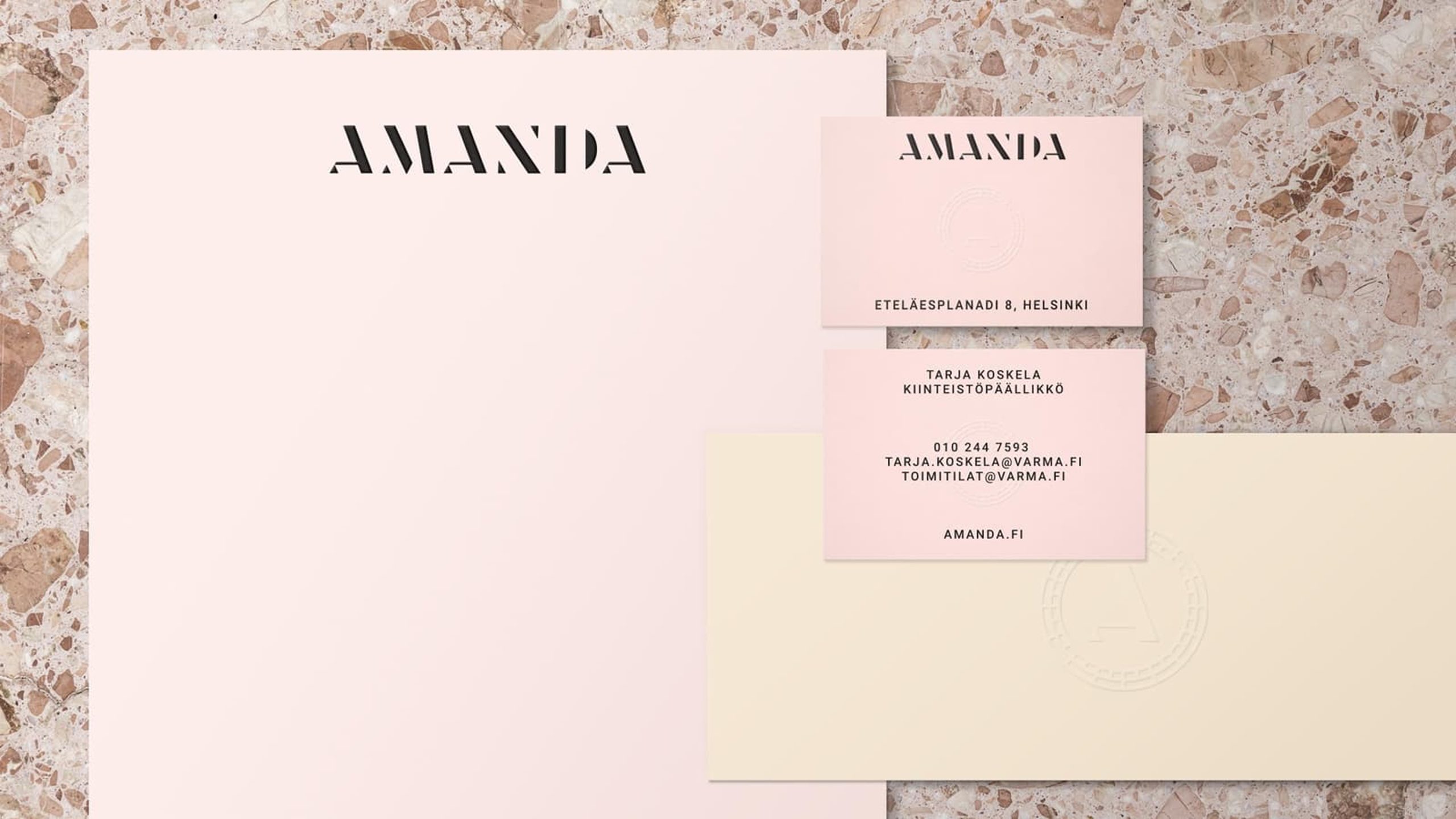 Amanda brand stationery by Werklig: blush pink letterhead and business cards on a terrazzo surface.
