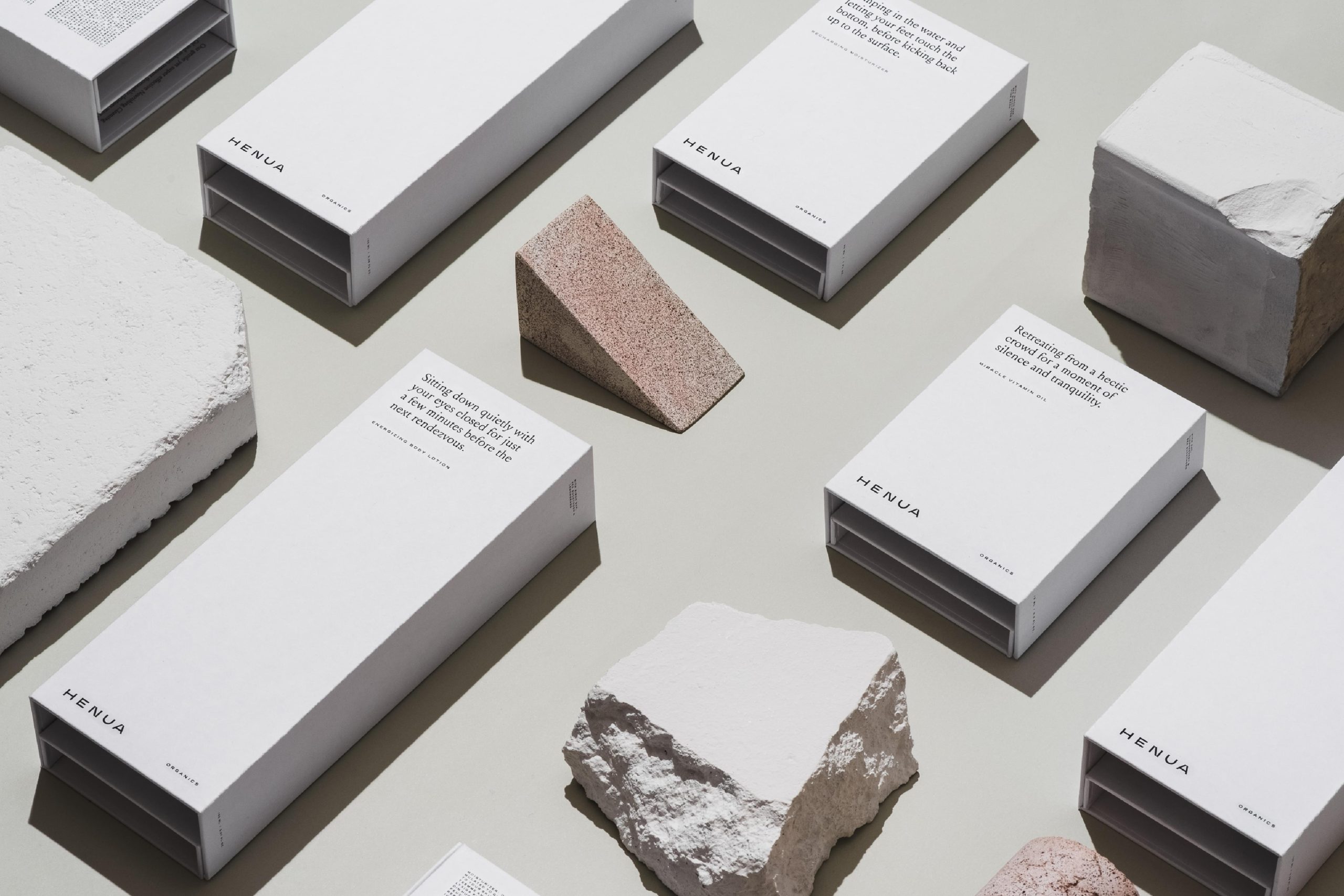 Henua stationery and business cards stacked among stone samples